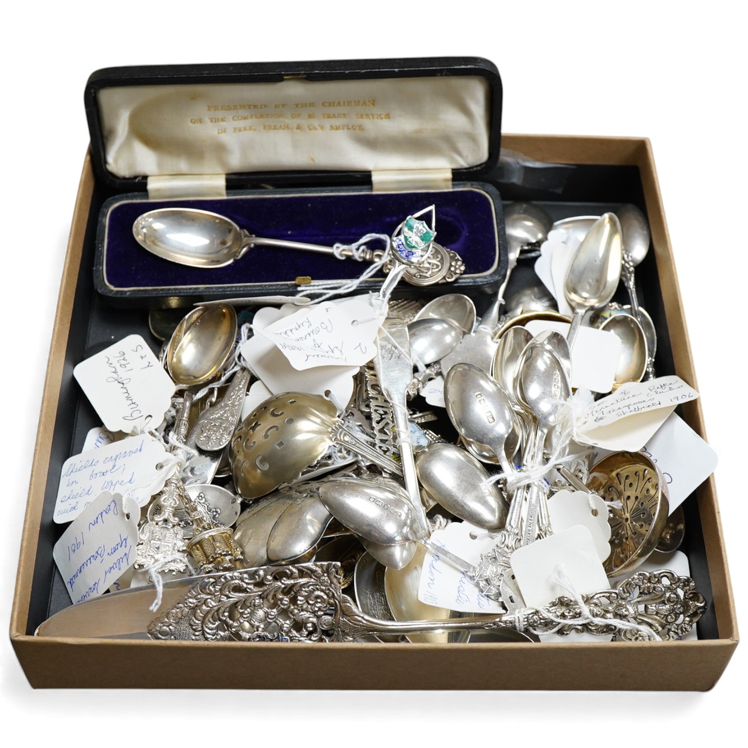 A large collection of assorted mainly 20th century silver and white metal commemorative and club spoons, some enamelled, including a set of six ' Society Miniature Rifle Clubs' teaspoons, by Walter Trickett, Sheffield, 1
